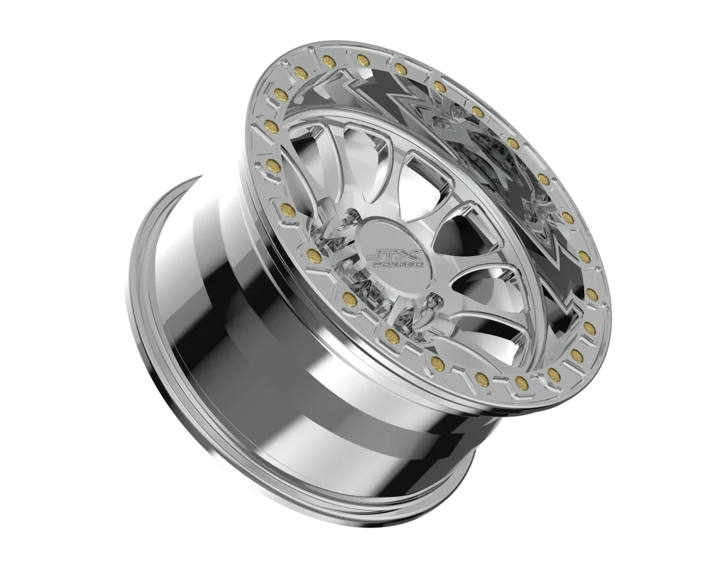 Silver alloy wheel with reflective finish.