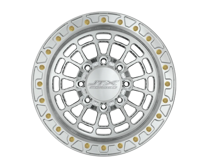 Silver alloy wheel with intricate design.