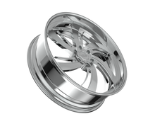 Chrome car wheel rim on black background.