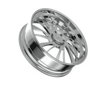 Chrome car rim on black background.