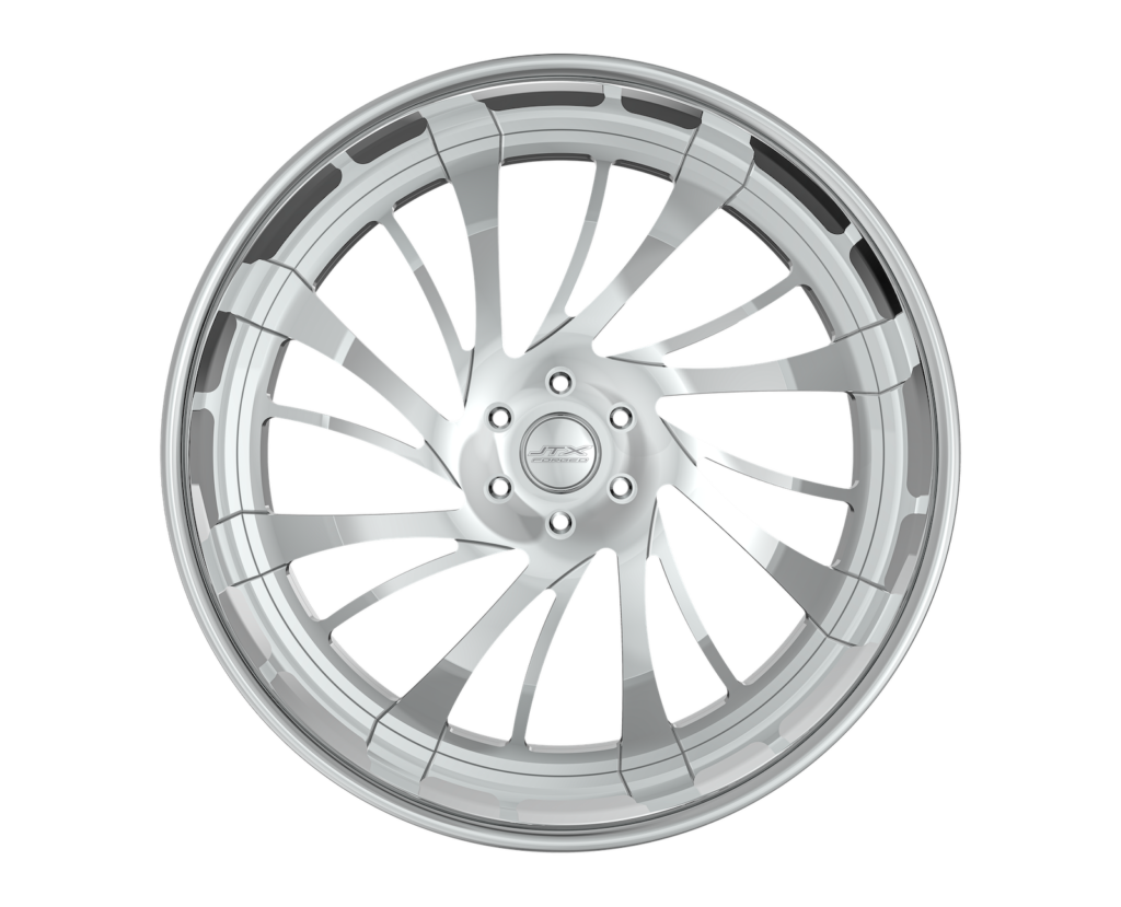Silver alloy wheel with intricate spoke design.