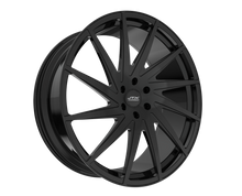 Black multi-spoke car wheel rim.
