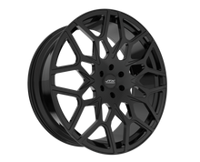 Black alloy wheel with intricate spoke design.
