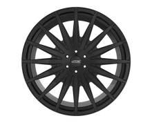 Black multi-spoke wheel on black background.