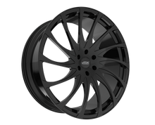 Black alloy wheel with intricate spoke design.
