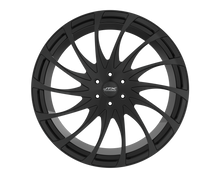 Black car wheel with intricate spoke design.