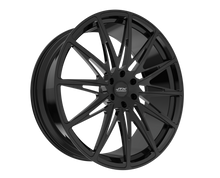 Black multi-spoke alloy wheel on display.
