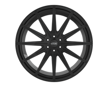 Black multi-spoke car wheel on black background.