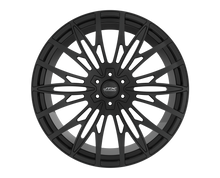 Black multi-spoke alloy wheel on black background.