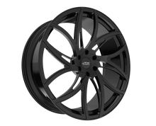 Black alloy wheel with intricate design.