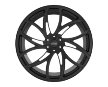 Black car wheel with intricate spoke design.