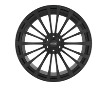 Black car wheel rim on black background.