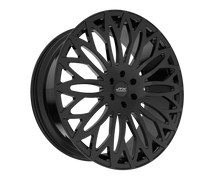 Black alloy wheel with intricate pattern design.