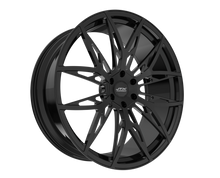 Black alloy wheel with intricate spoke design.