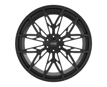 Black alloy wheel with intricate spoke design.