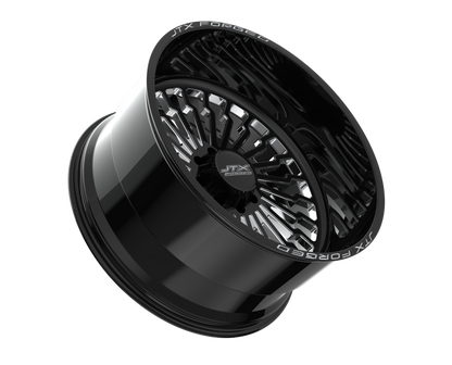 Black alloy wheel with intricate spoke design.