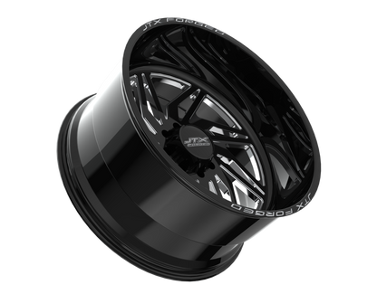 Black alloy wheel with intricate spoke design.