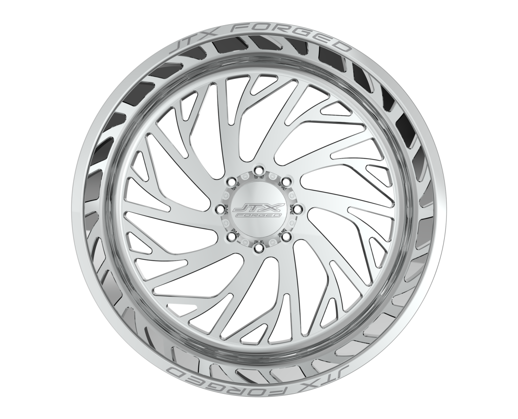 Intricate silver alloy wheel on black background.