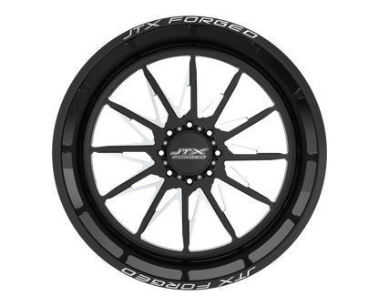 Black and silver JTX Forged wheel rim.