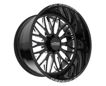 Black alloy wheel with intricate spoke design.