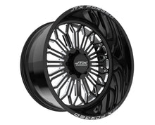 Black JTX Forged wheel with intricate design.