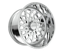 Chrome alloy wheels with intricate spoke design.