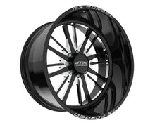 Black and silver JTX Forged wheel rim.