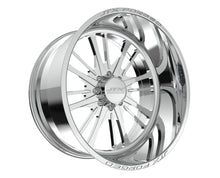 Chrome car wheel rim with intricate design.