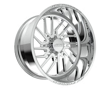 Chrome car wheel rim with intricate design.