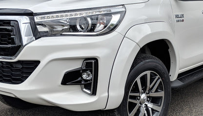 Close-up front bumper and wheel arch of Toyota Hilux 2020 showing seamless integration of EGR Fender Flares