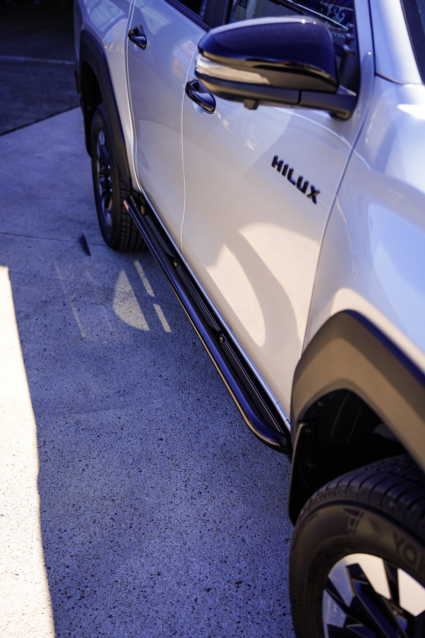 Toyota Hilux N90 ANGLED Rock Sliders / Side Steps - Powdercoated