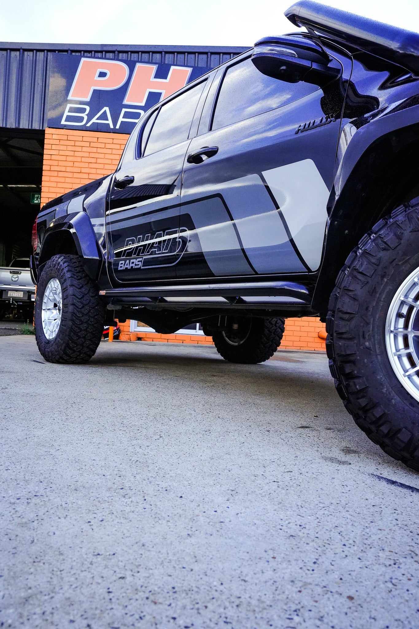 Toyota Hilux N80 'Mac Preston Big Tube' ANGLED Rock Sliders / Side Steps - Powdercoated