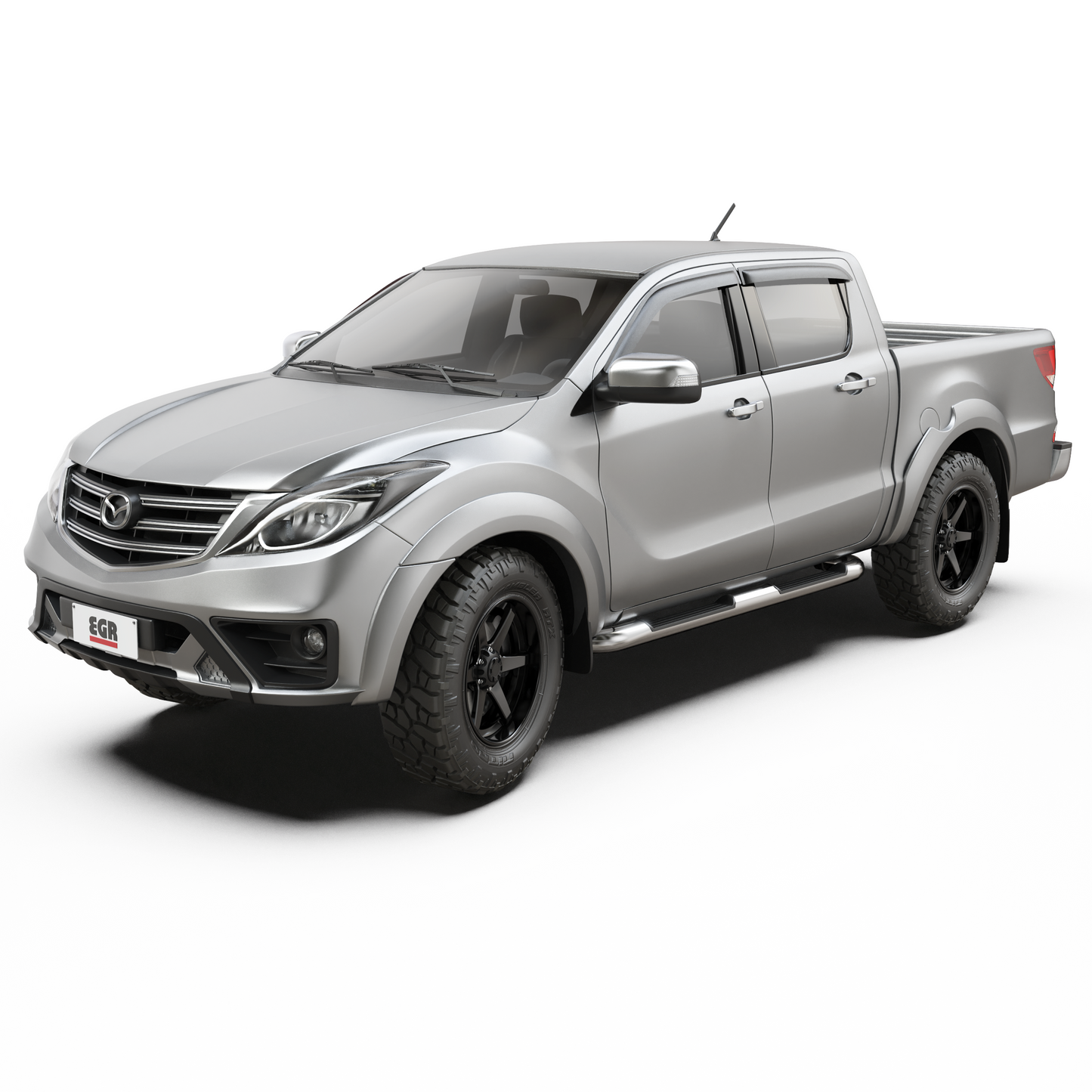 Angled front view of Mazda BT-50 upgraded with EGR Fender Flares, emphasizing the aggressive off-road appearance and smooth OEM-style finish