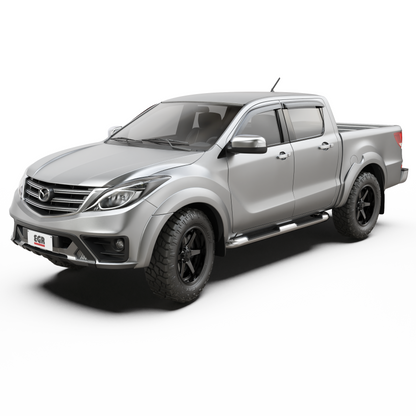 Angled front view of Mazda BT-50 upgraded with EGR Fender Flares, emphasizing the aggressive off-road appearance and smooth OEM-style finish