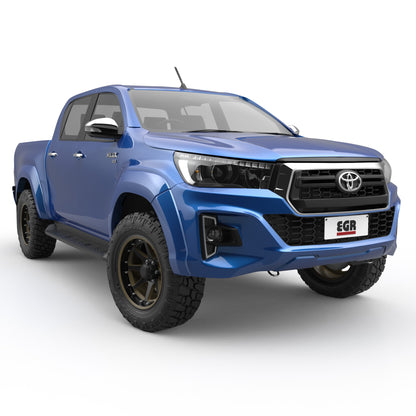Blue Toyota Hilux 2018–2020 equipped with full EGR fender flare kit, front three-quarter angle